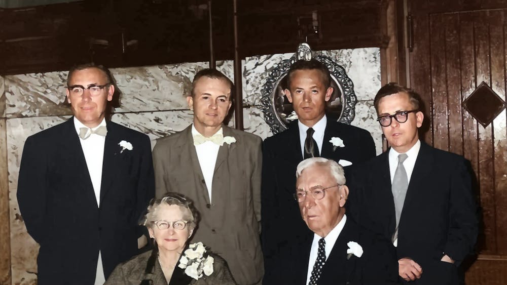 a group of people posing for the camera