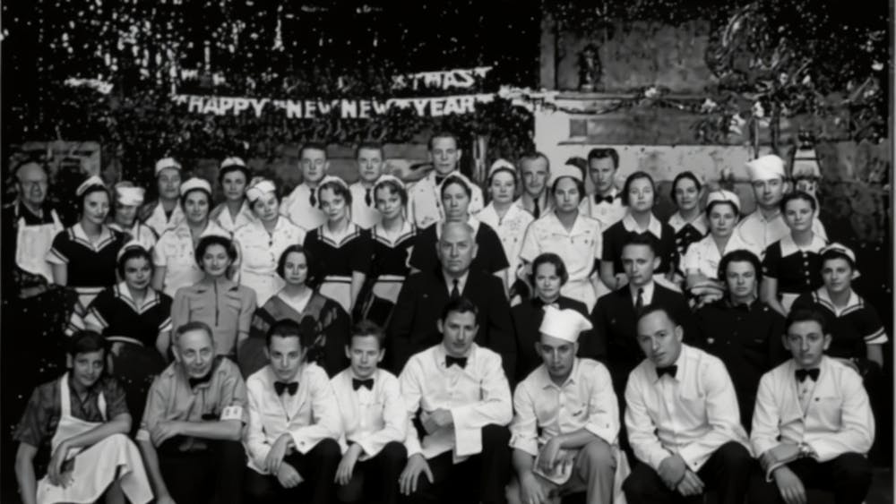 a group of people posing for the camera