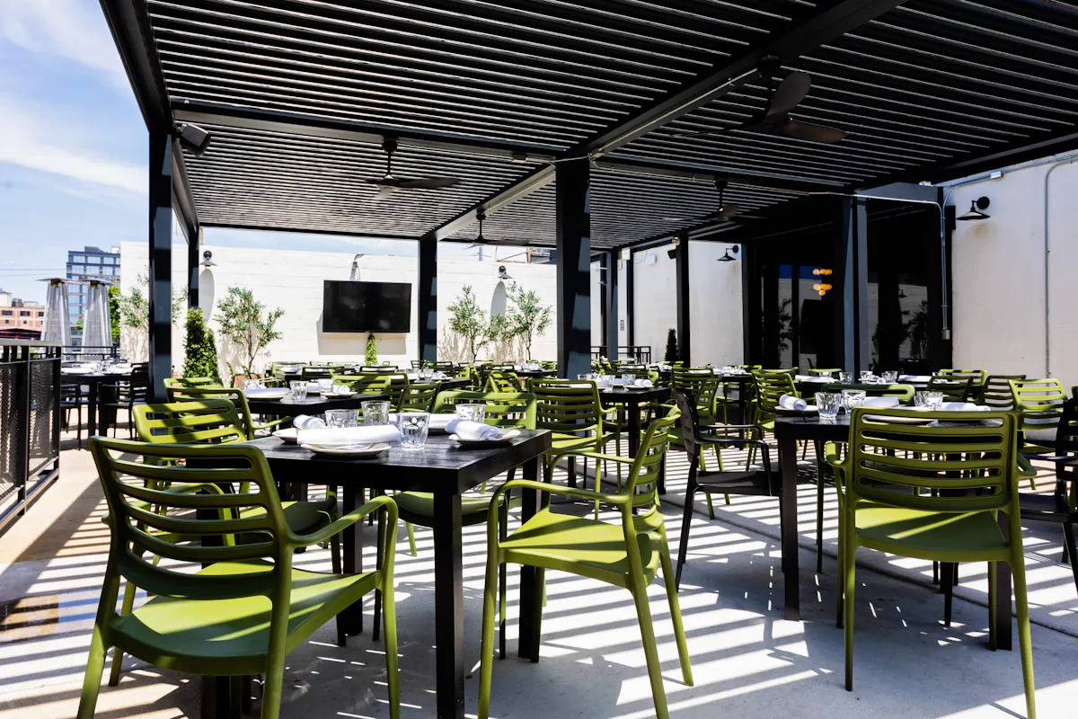 a dining room table in front of a building