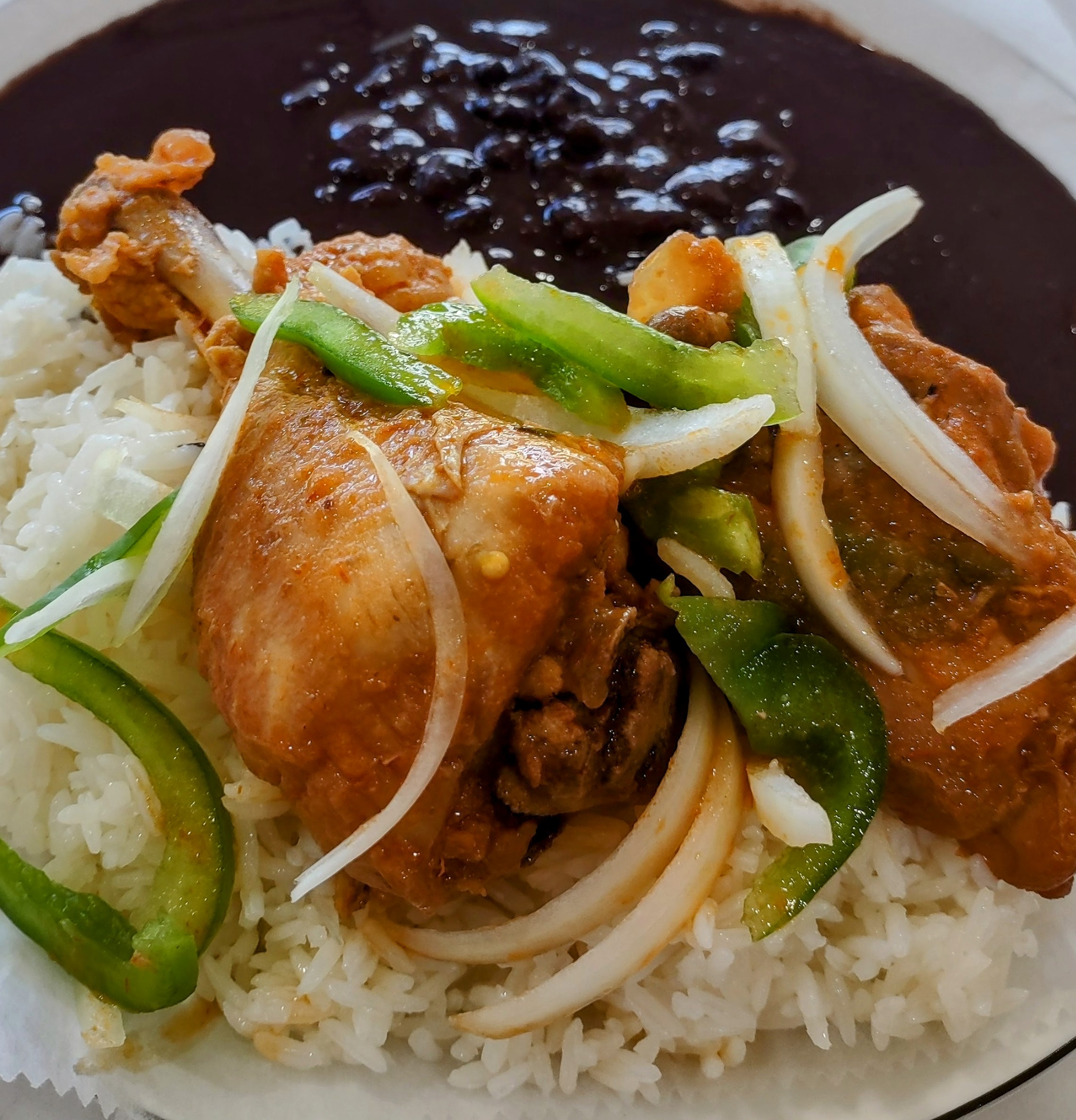 WHITE RICE BALCK BEANS AND STEW CHICKEN
