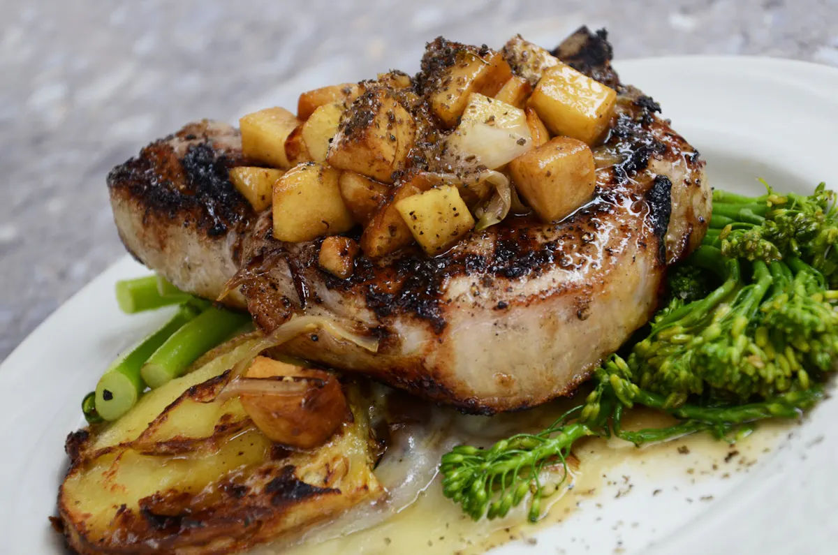 porkchop and veggies on a plate