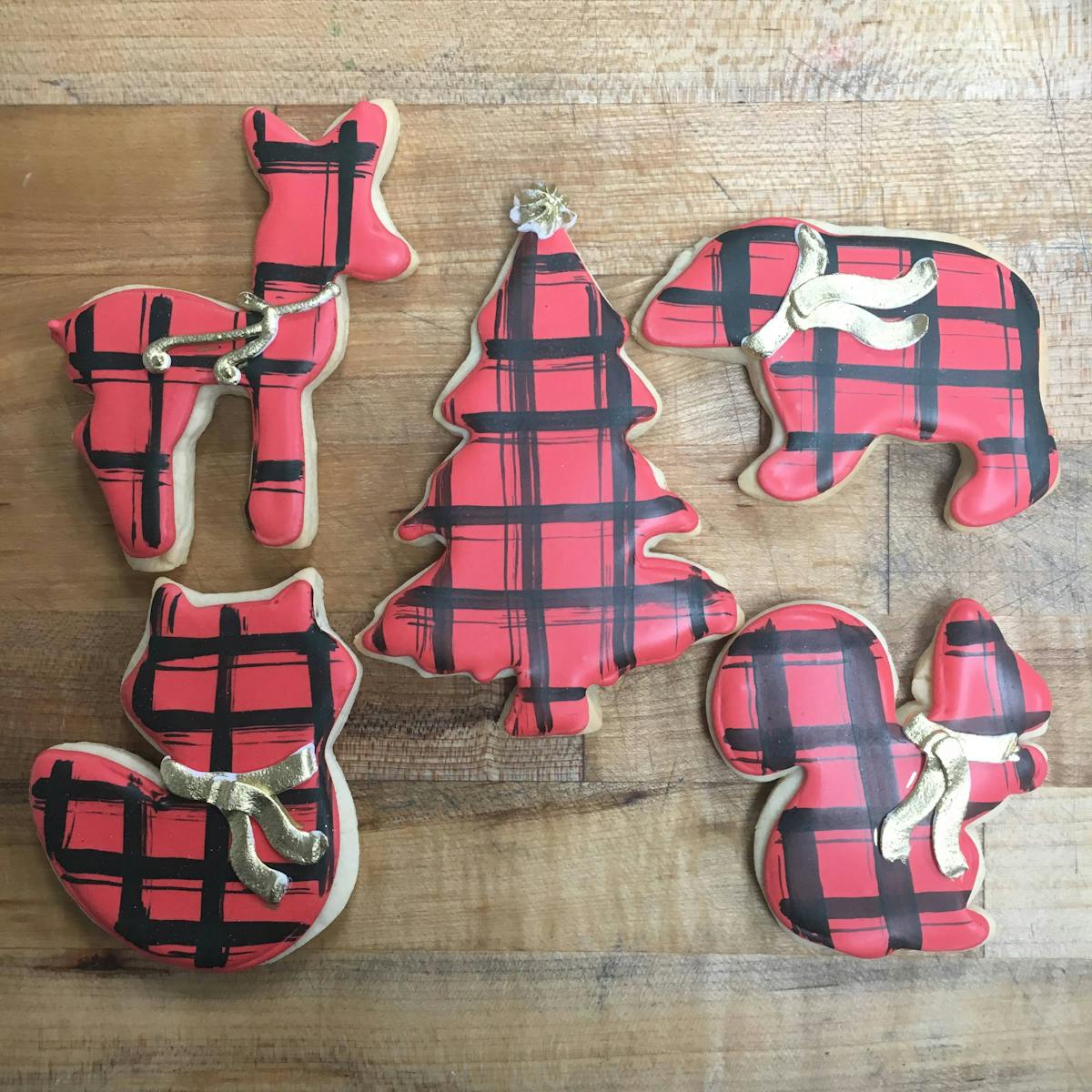 buffalo plaid woodland creature and tree decorated cookies