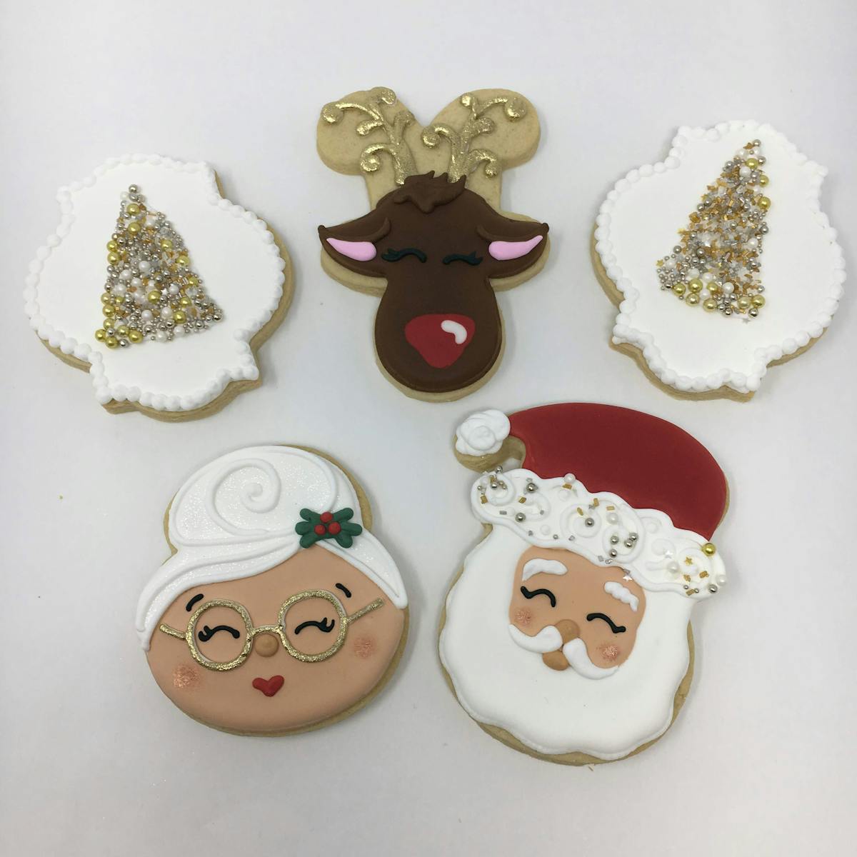 santa, mrs claus, rudolph and christmas tree cookies