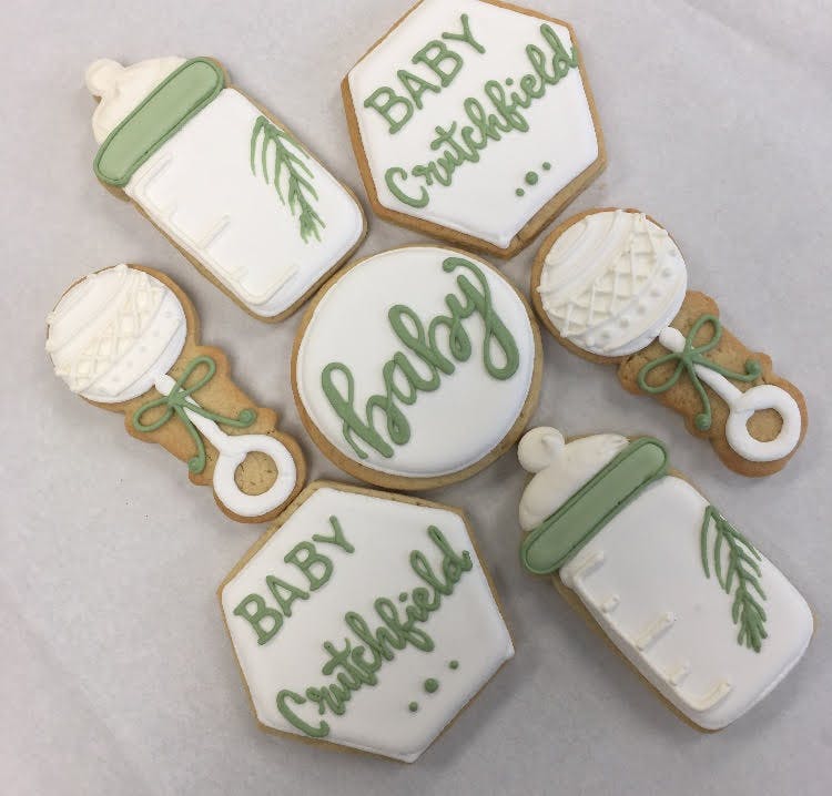 simple off white and green baby shower cookies