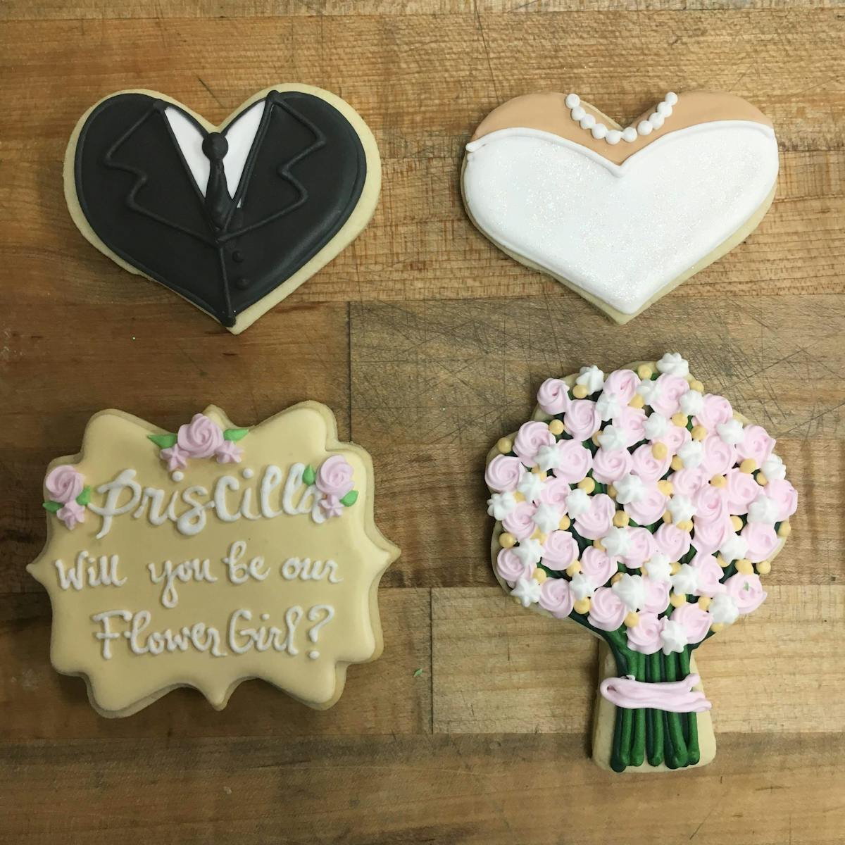 a decorated cookies bridal/wedding on a table