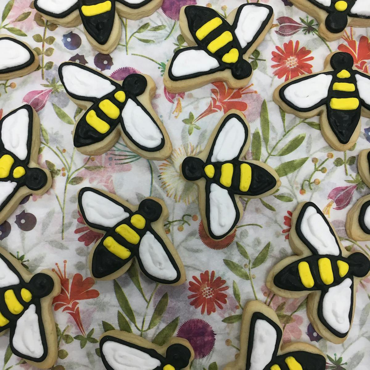 bees on top of floral paper