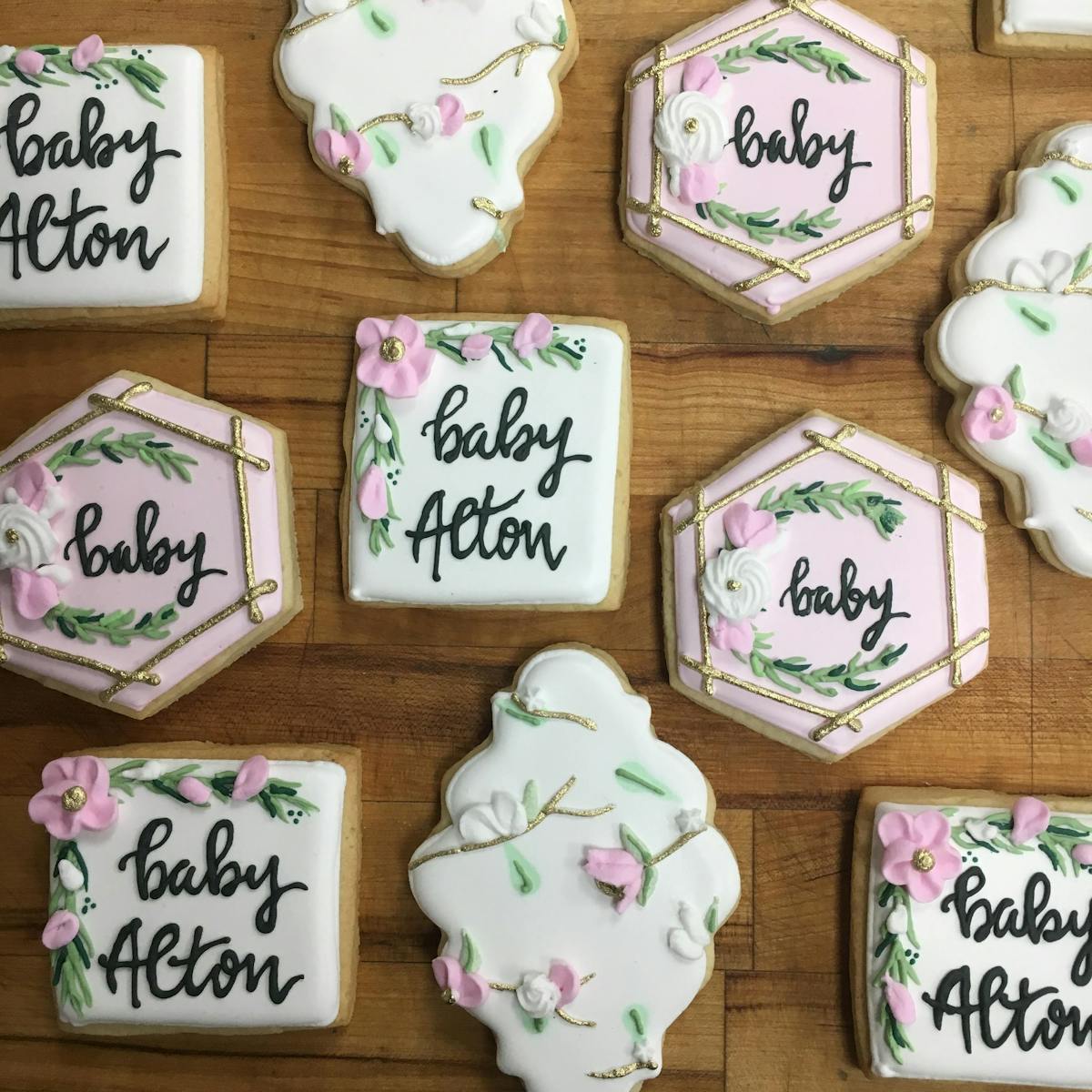 floral themed decorated cookies for baby girl shower
