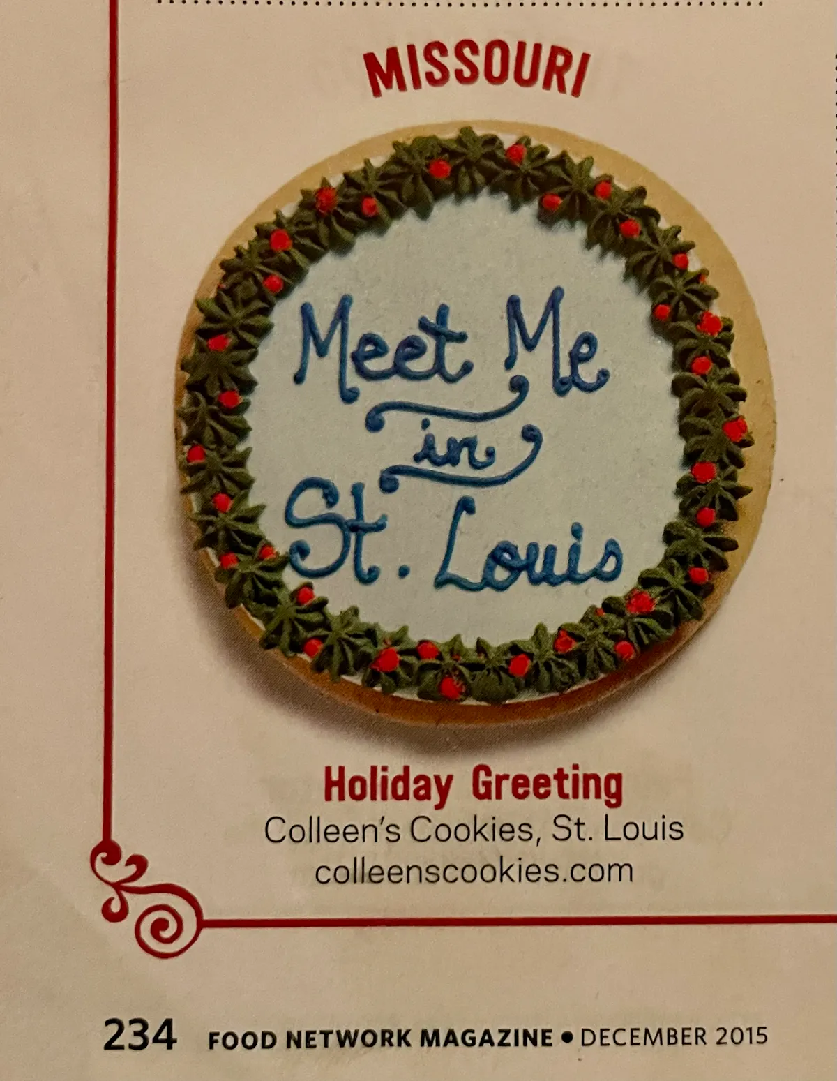 a cookie with frosting and writing