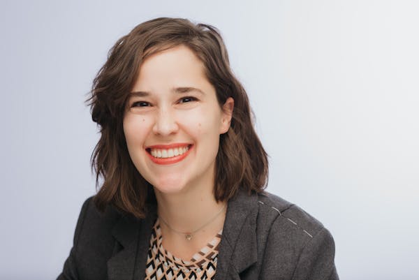 a woman smiling for the camera