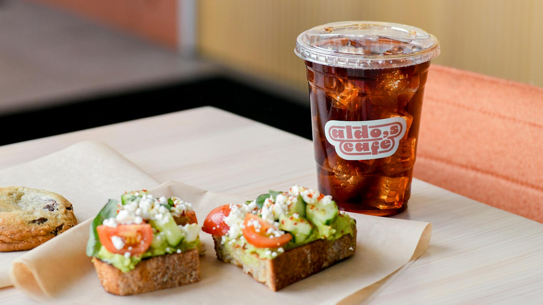 avocado toast and iced coffee at Aldo's Cafe
