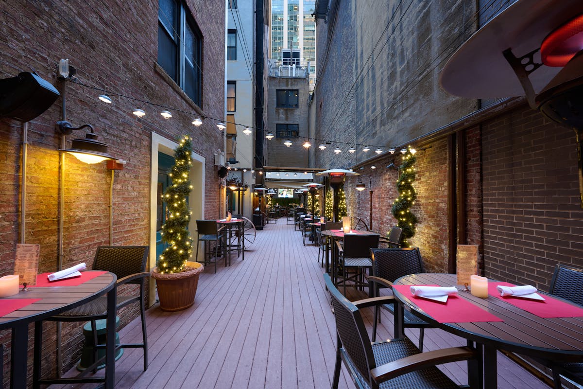 a dining room table in front of a building
