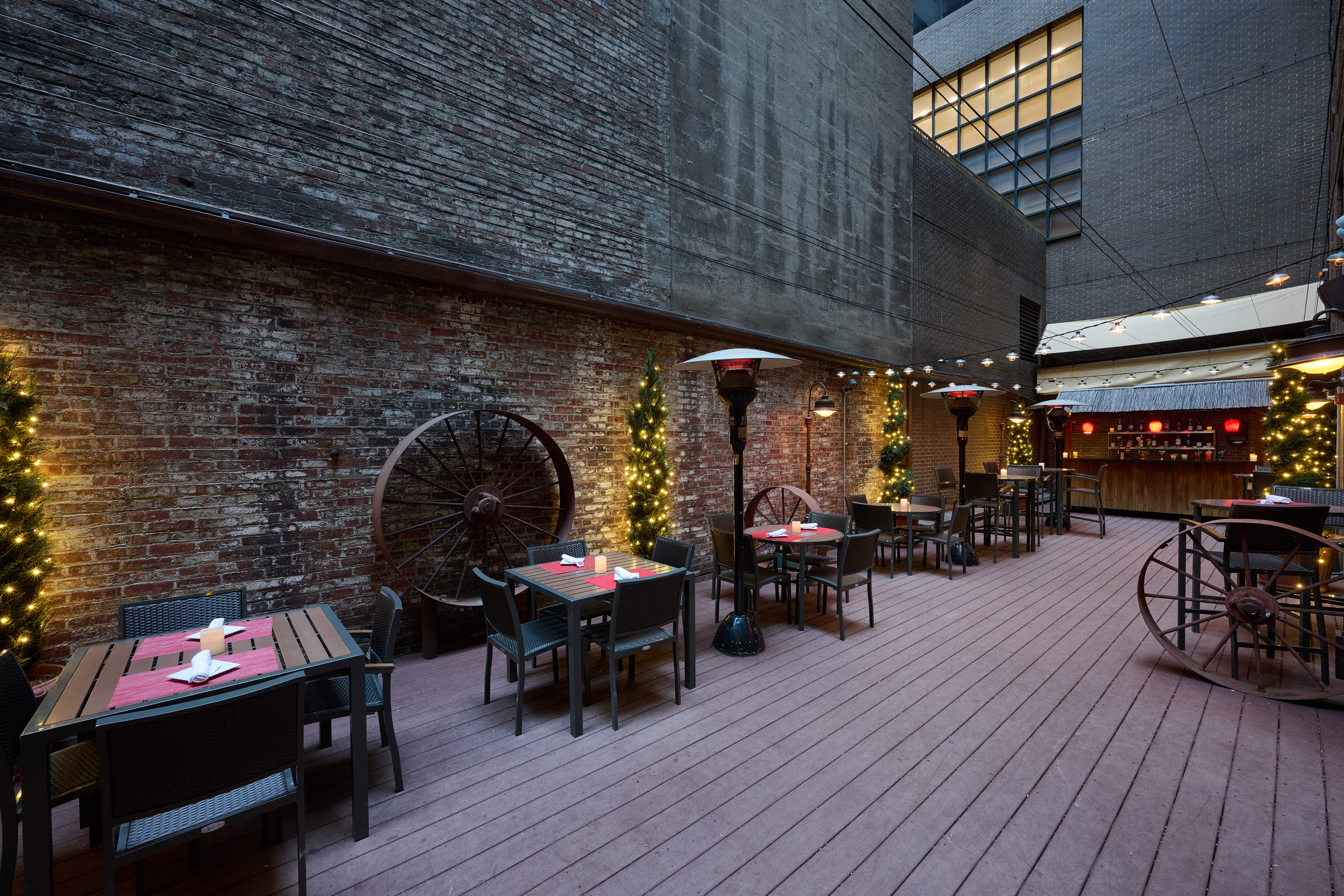 a chair sitting in front of a brick building