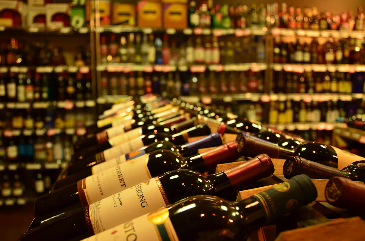 A room with many bottles of different wines
