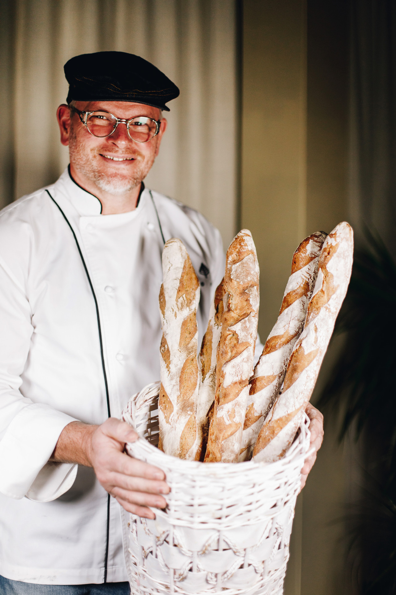 a man holding a glass bowl