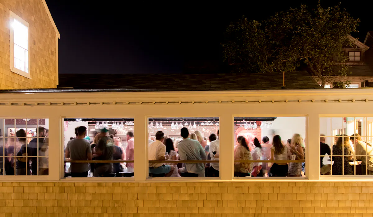 a group of people standing in front of a building