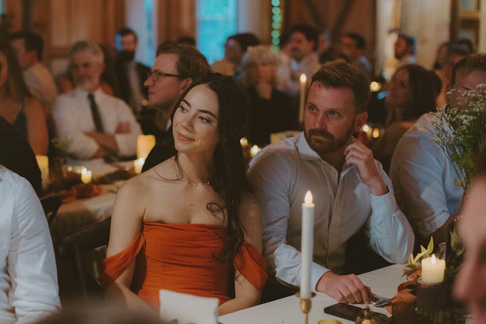 a group of people sitting at a table