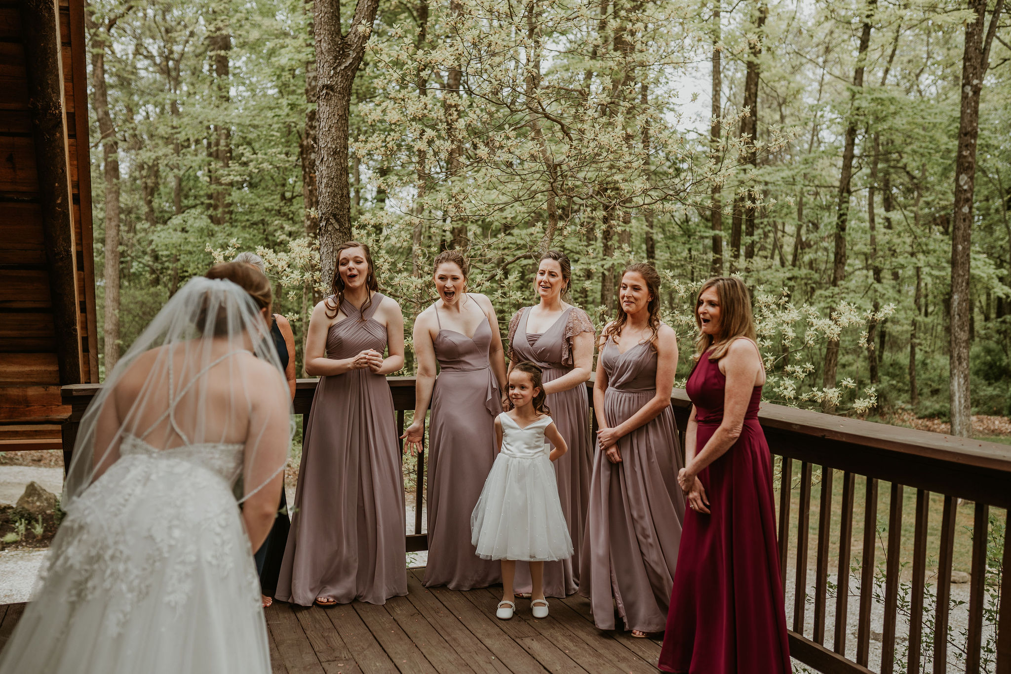 a group of people in a forest