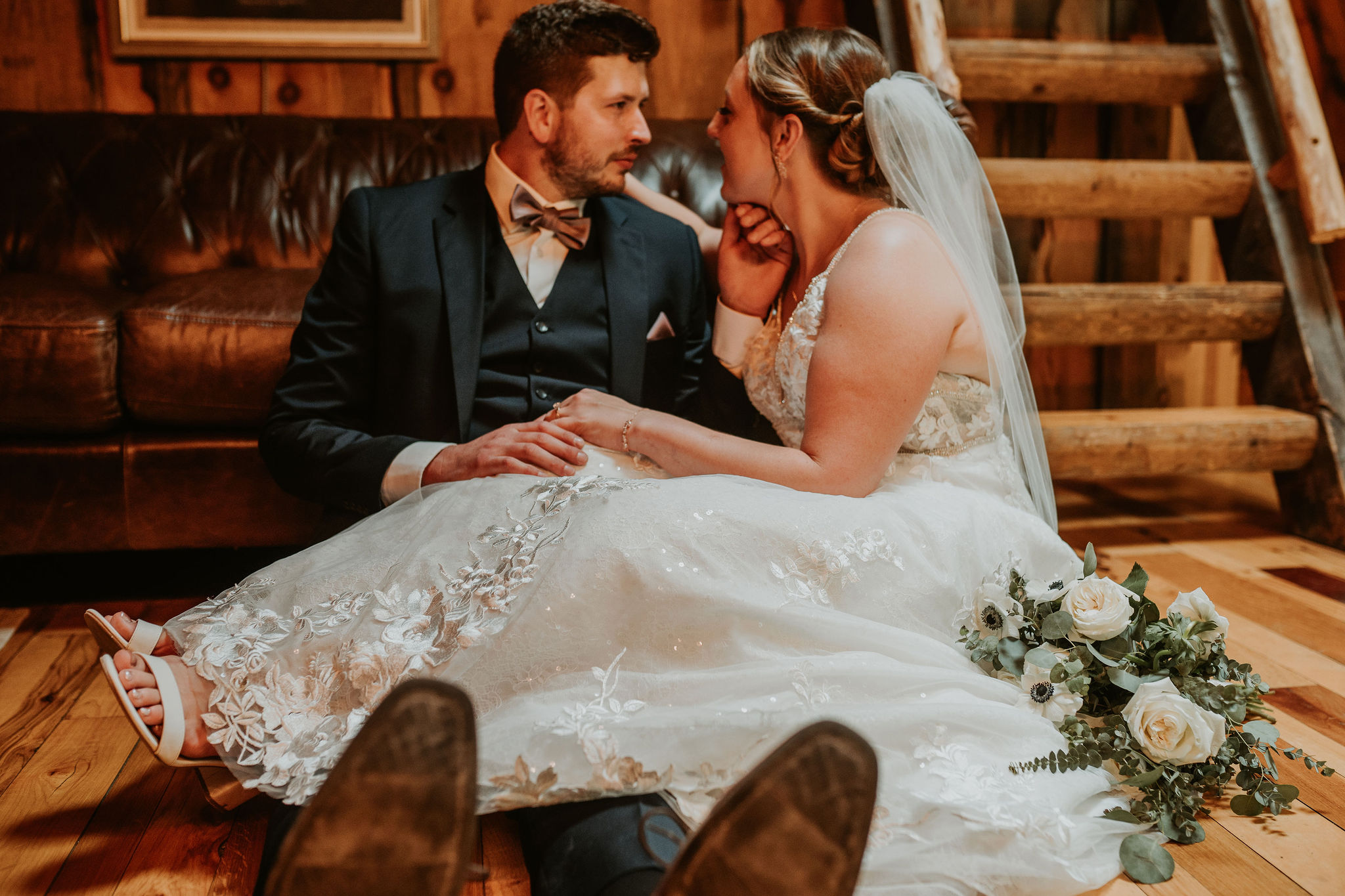 a person sitting at a table with a cake