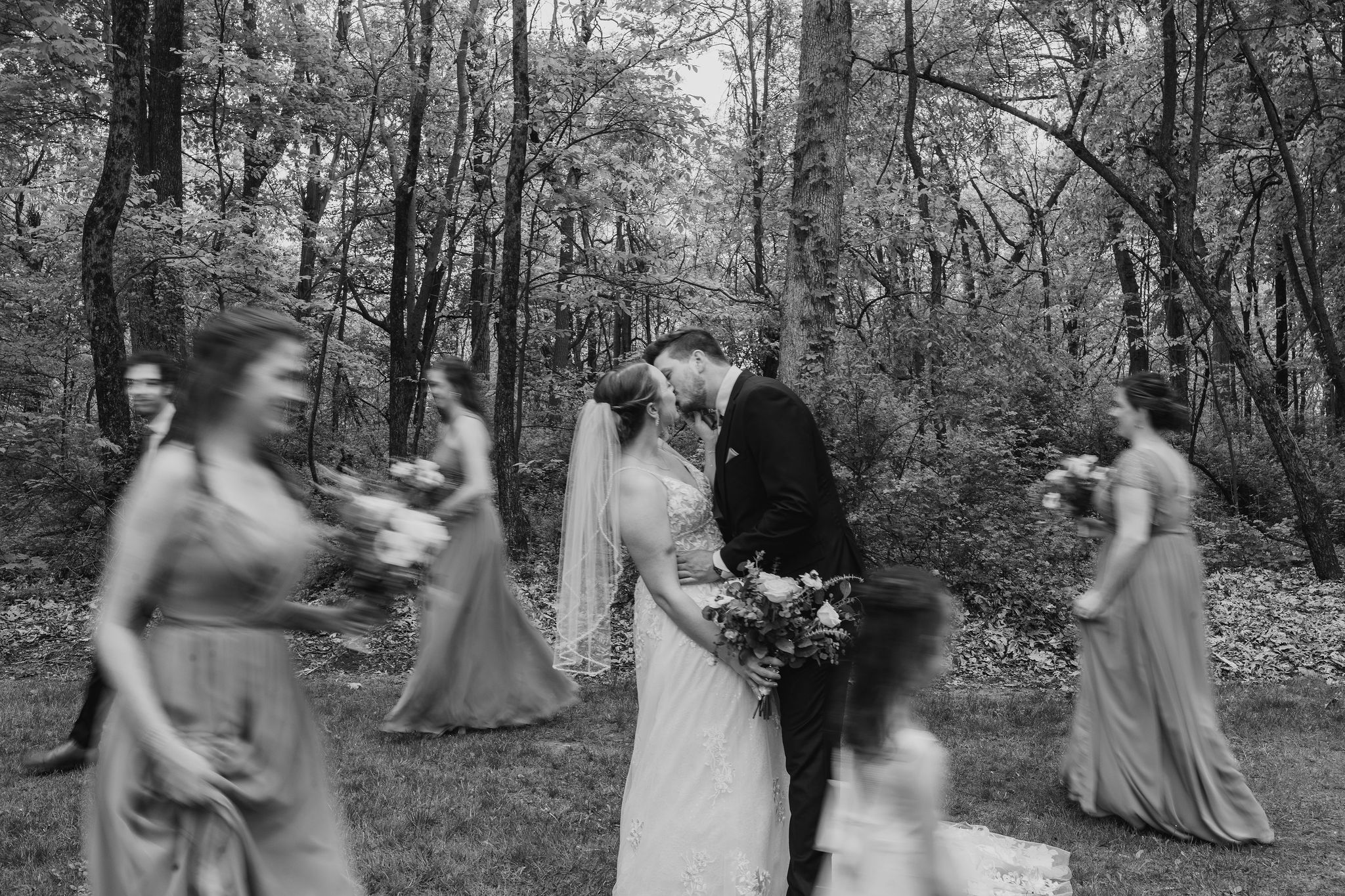 a group of people in a forest