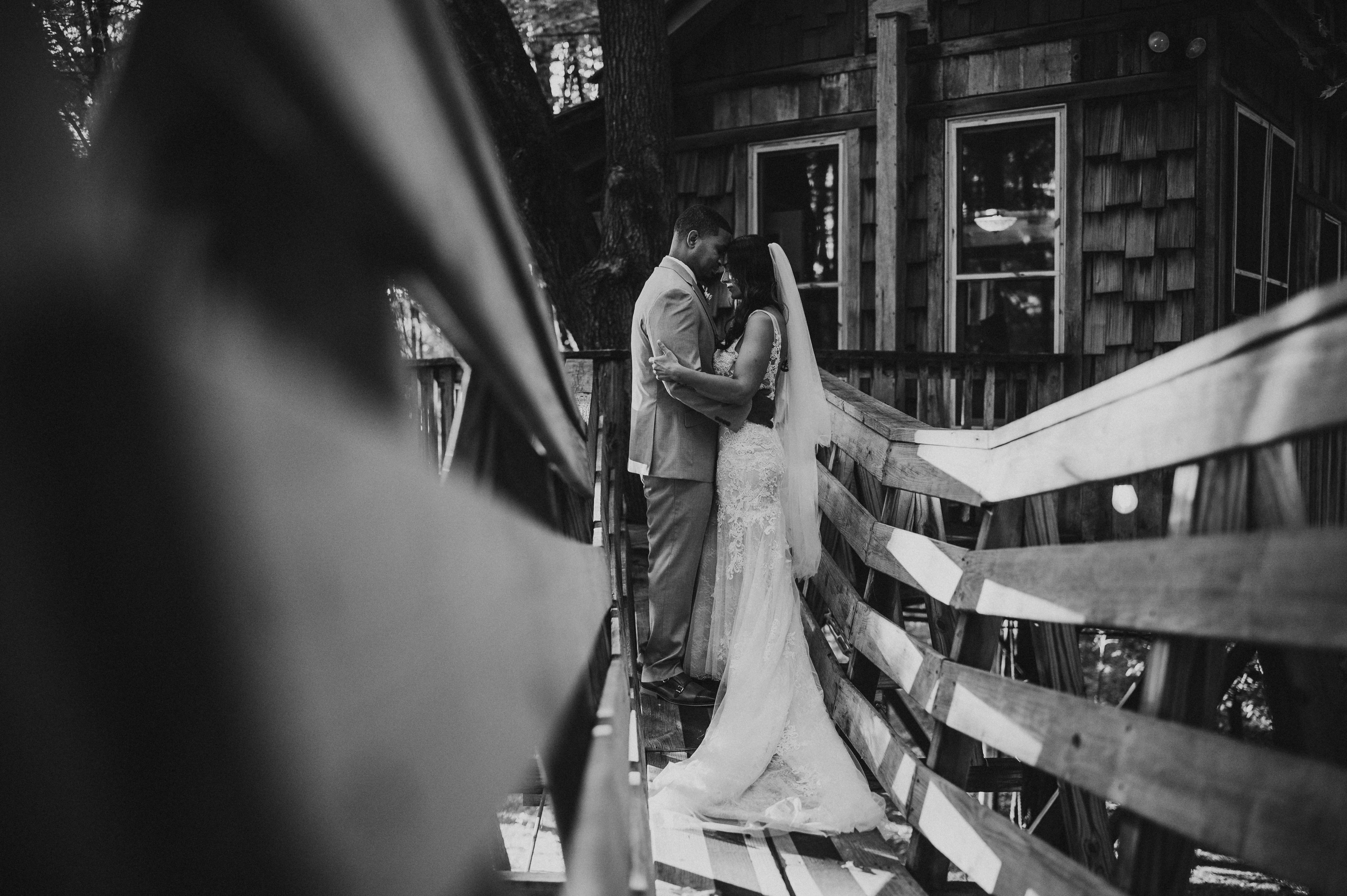 a man and woman standing on a deck