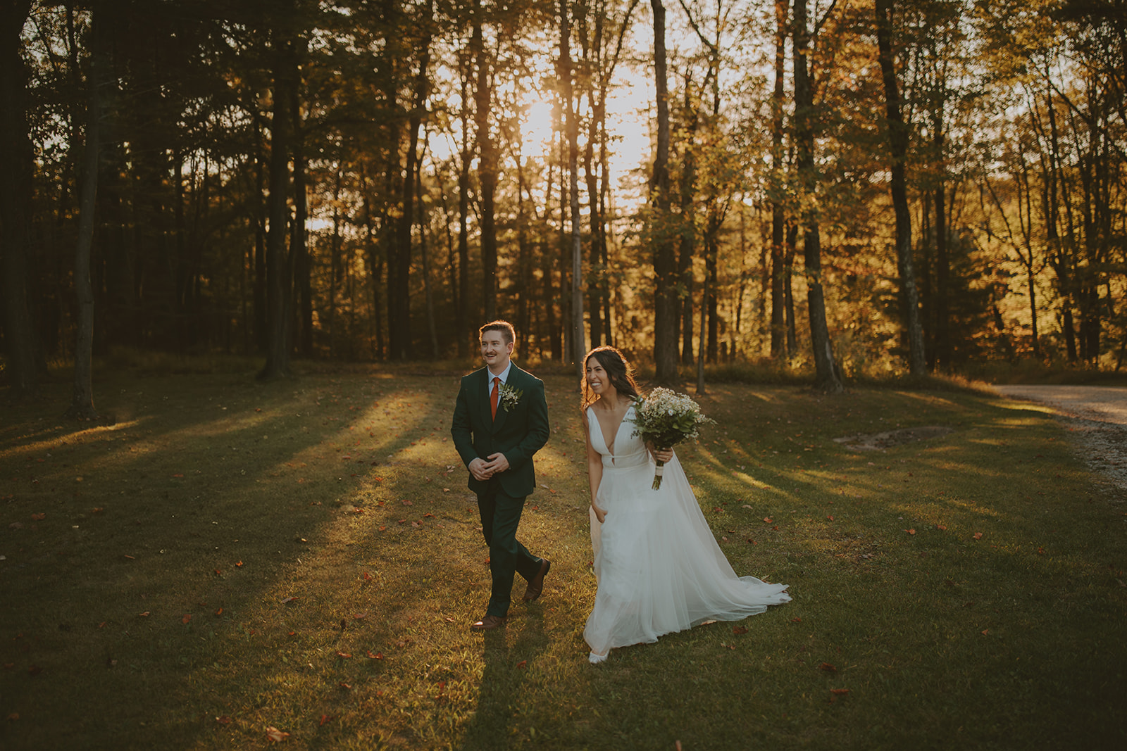 a person standing next to a forest