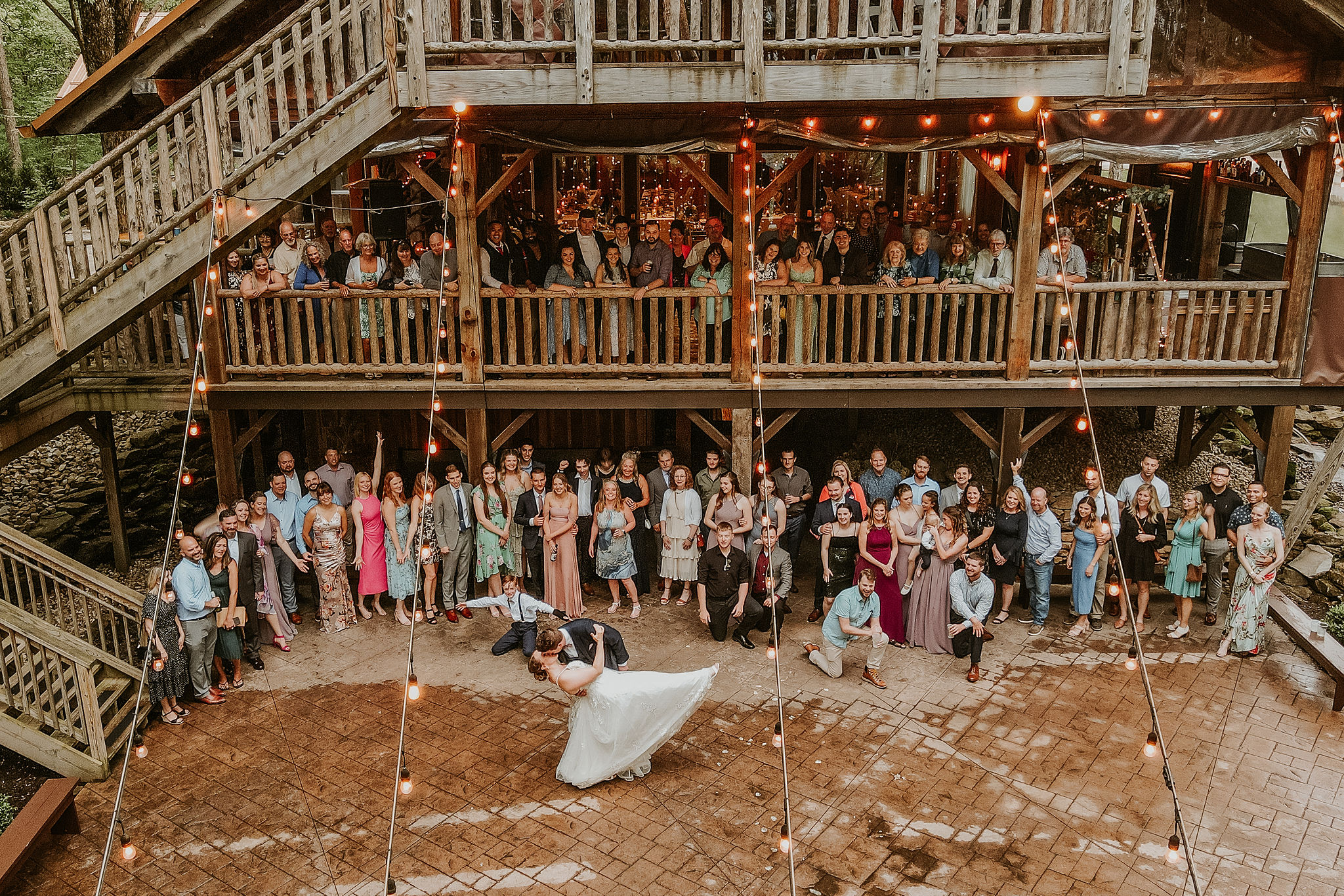 a crowd of people standing in front of a building