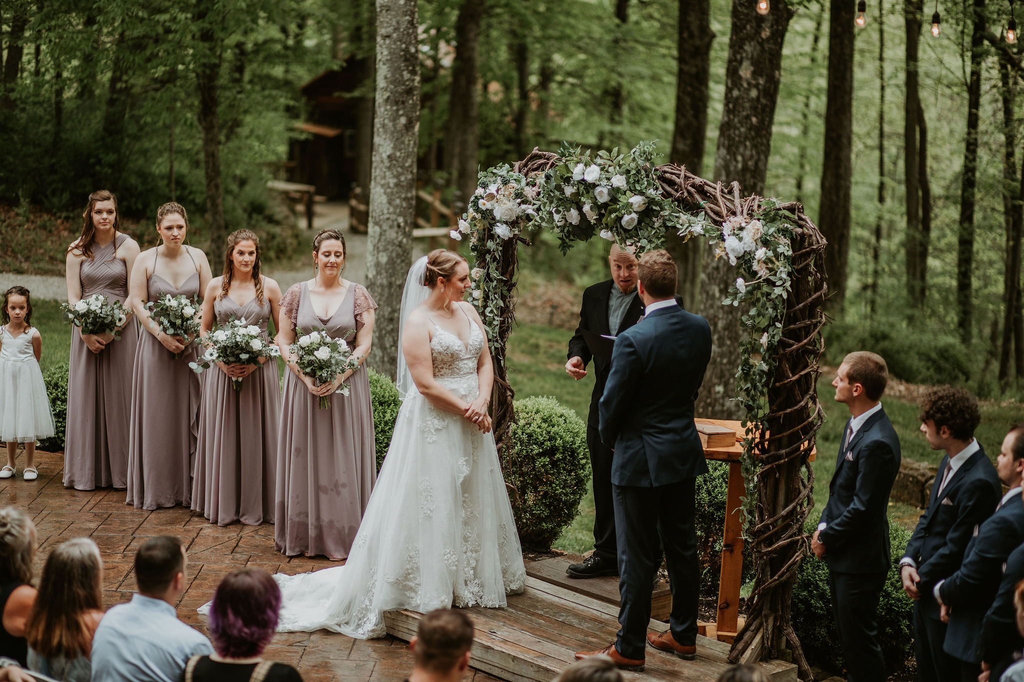 a group of people in a forest