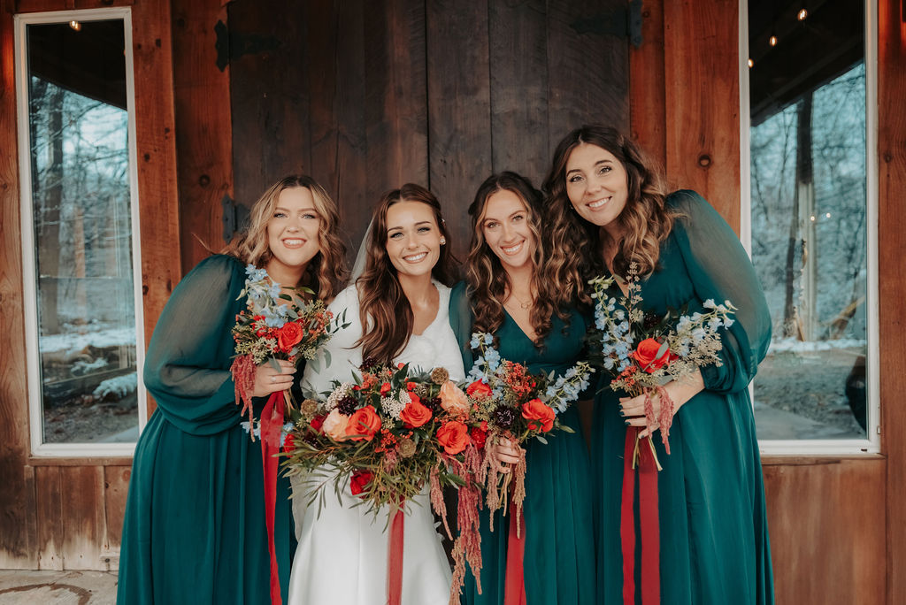 a woman standing in front of a window
