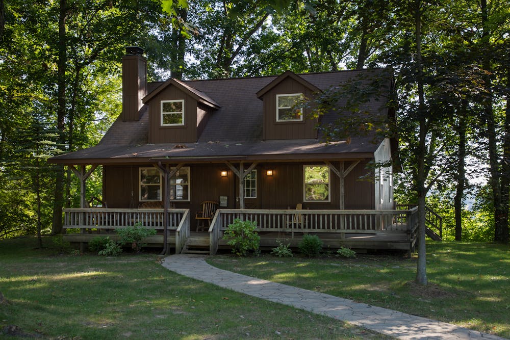 a house with trees in the front yard