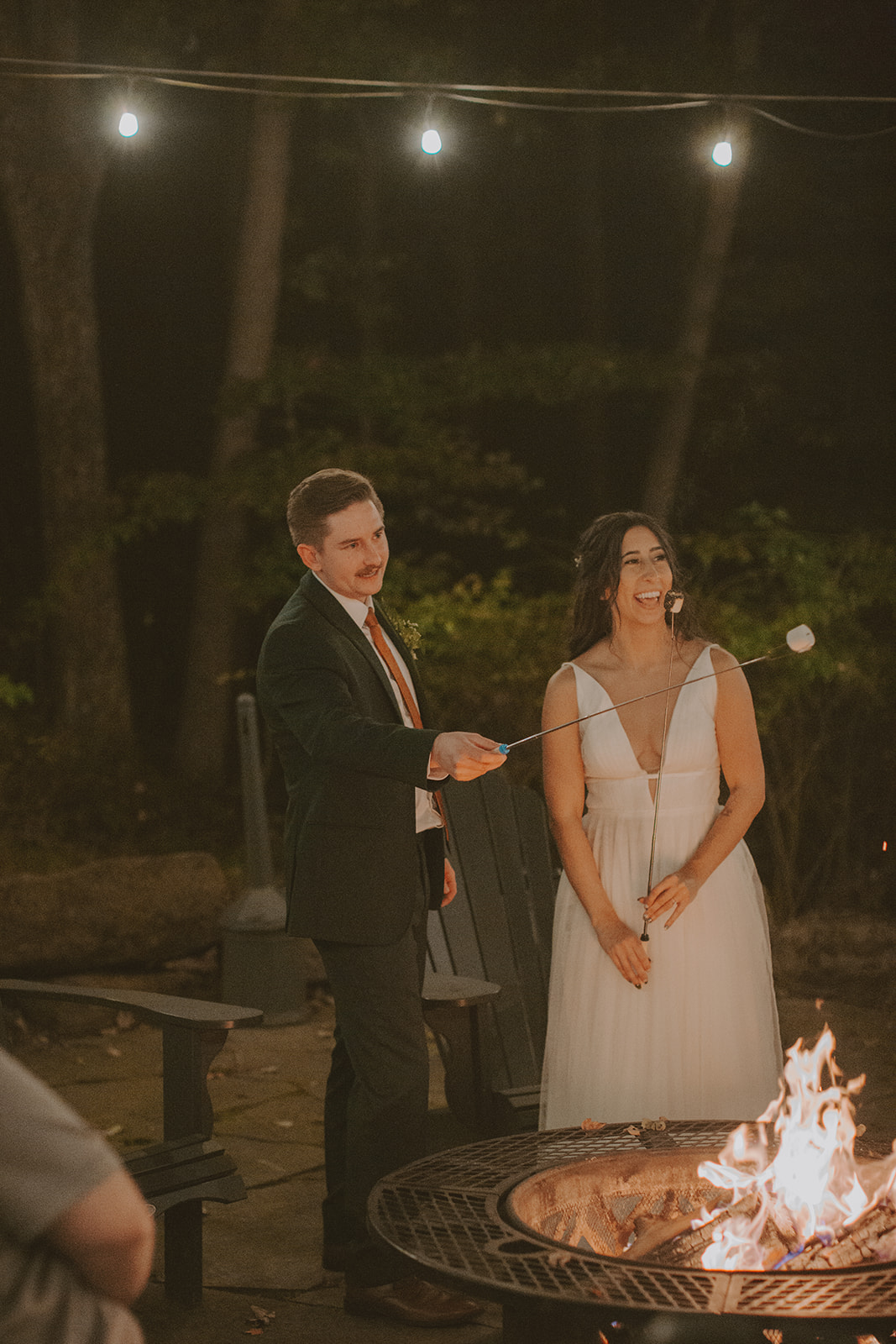 a person standing in front of a group of people posing for the camera