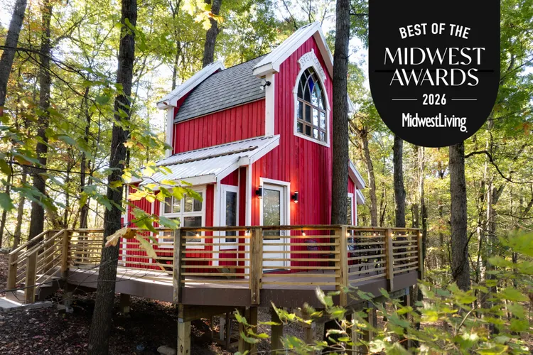 a red house in the woods
