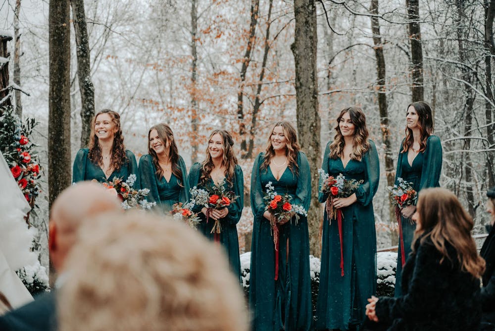 a group of people posing for the camera