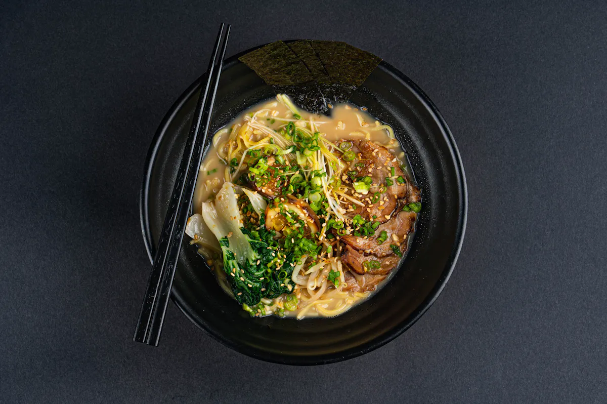 a bowl of food sitting on a table