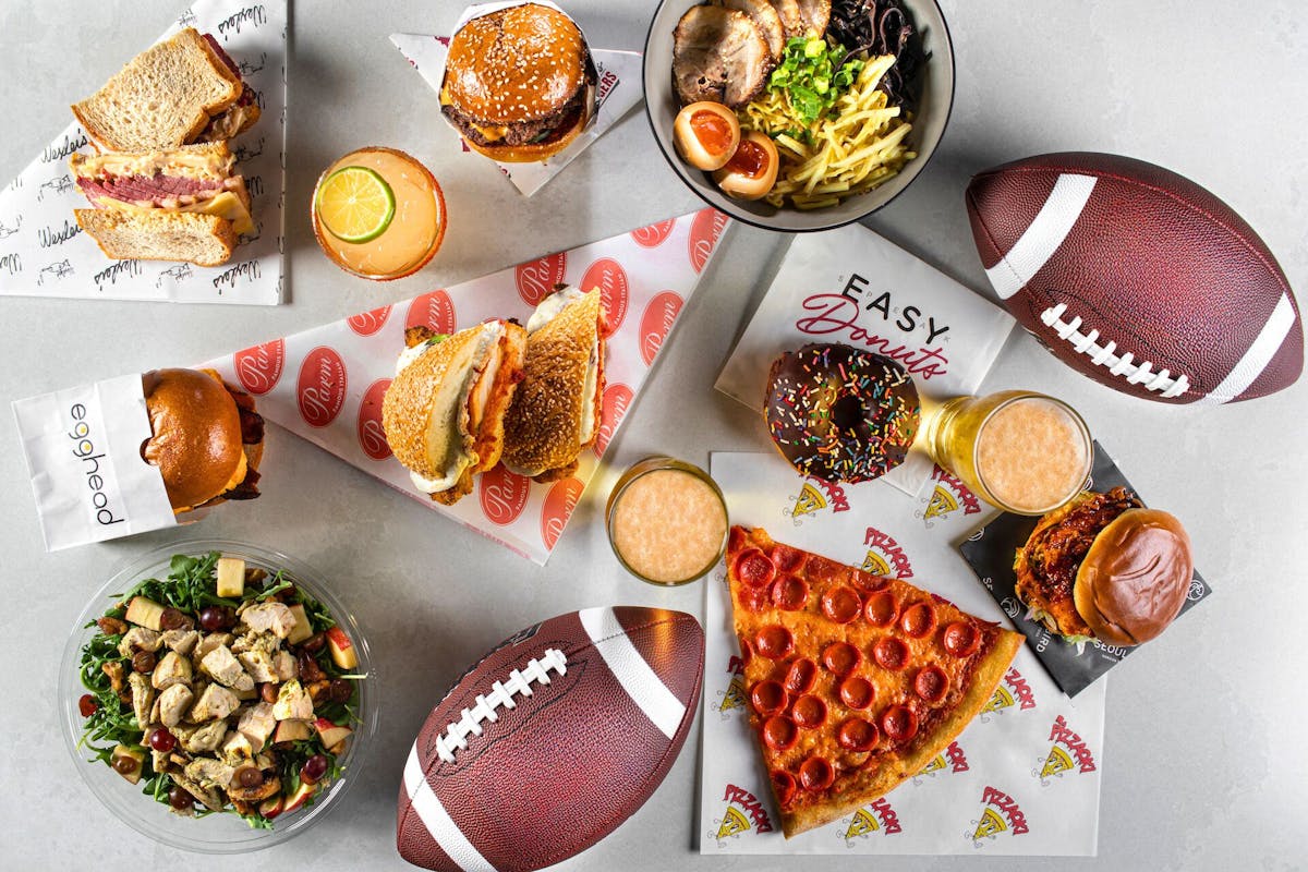 a bunch of different types of food on a table