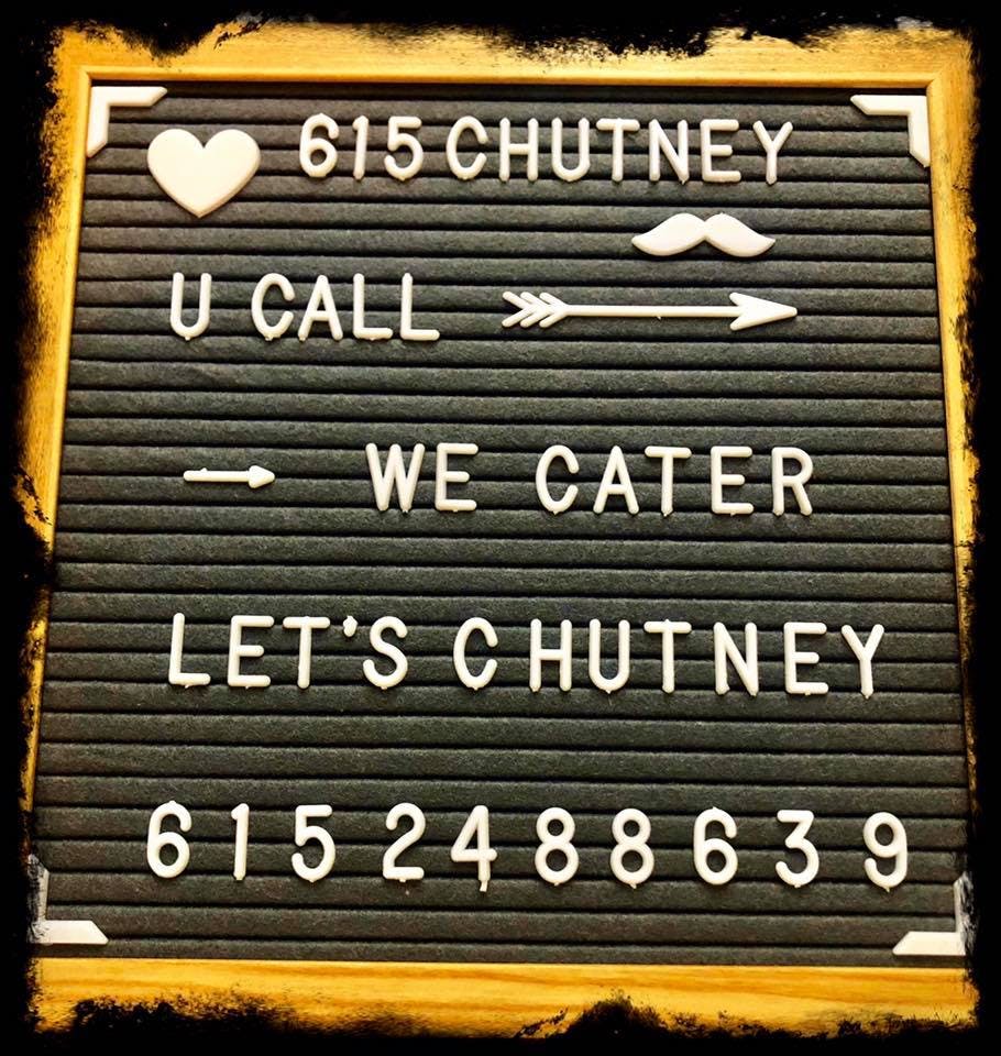 a close up of a board with white letters