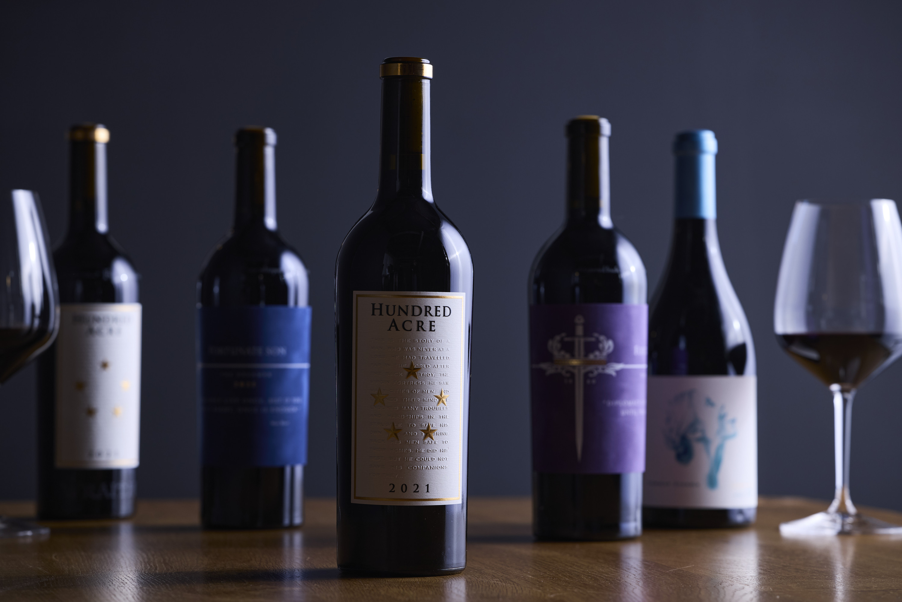 a group of wine bottles on a table