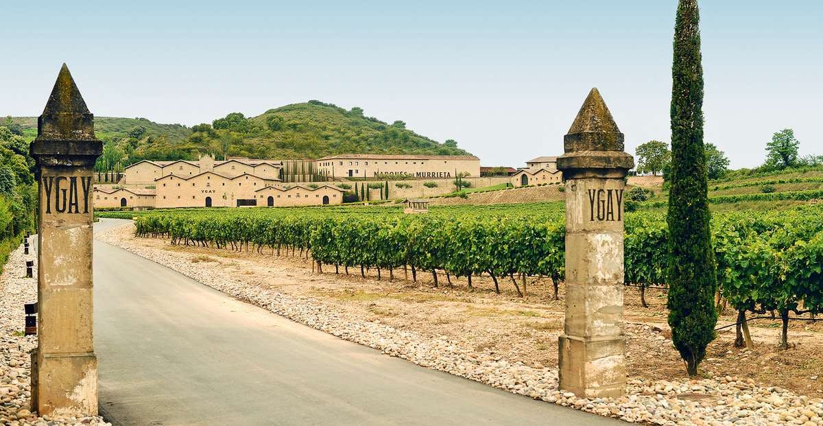 a castle with a clock on the side of a building