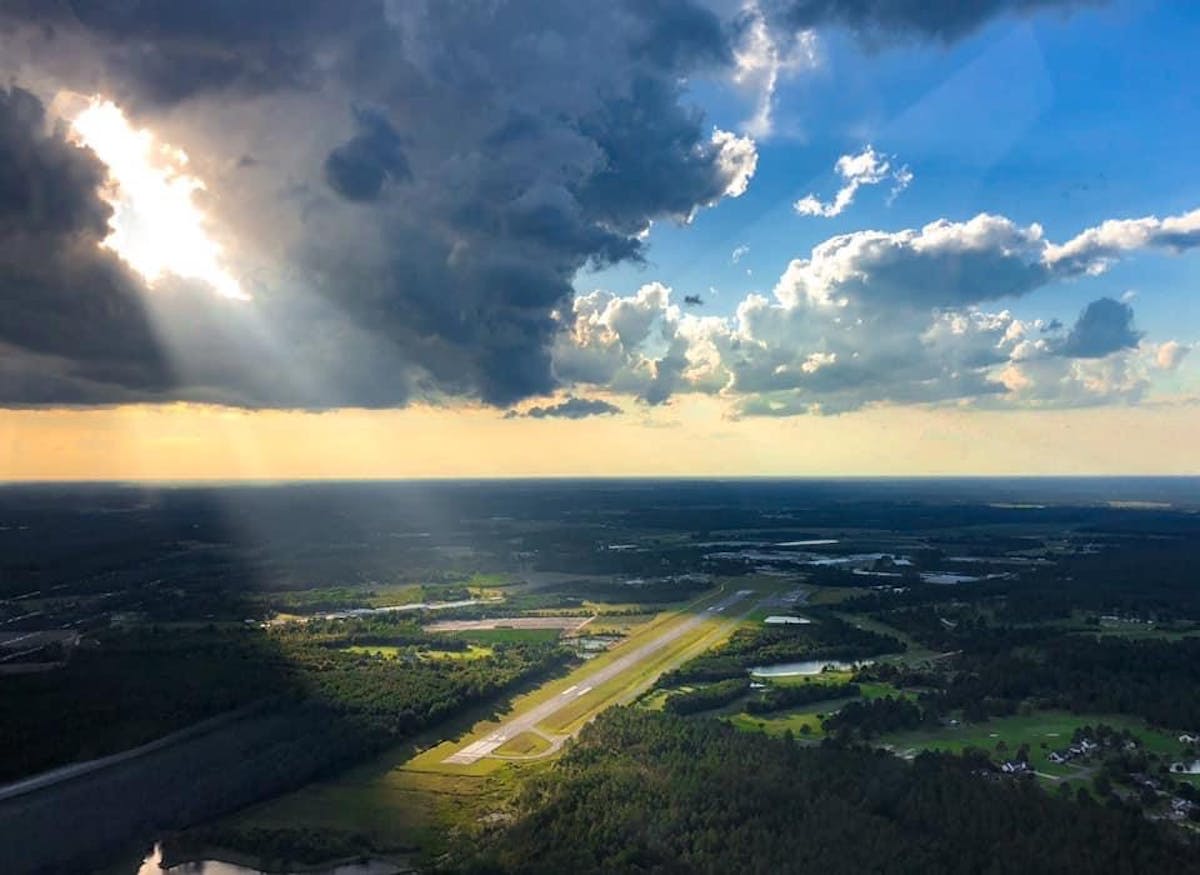 clouds in the sky over a body of water