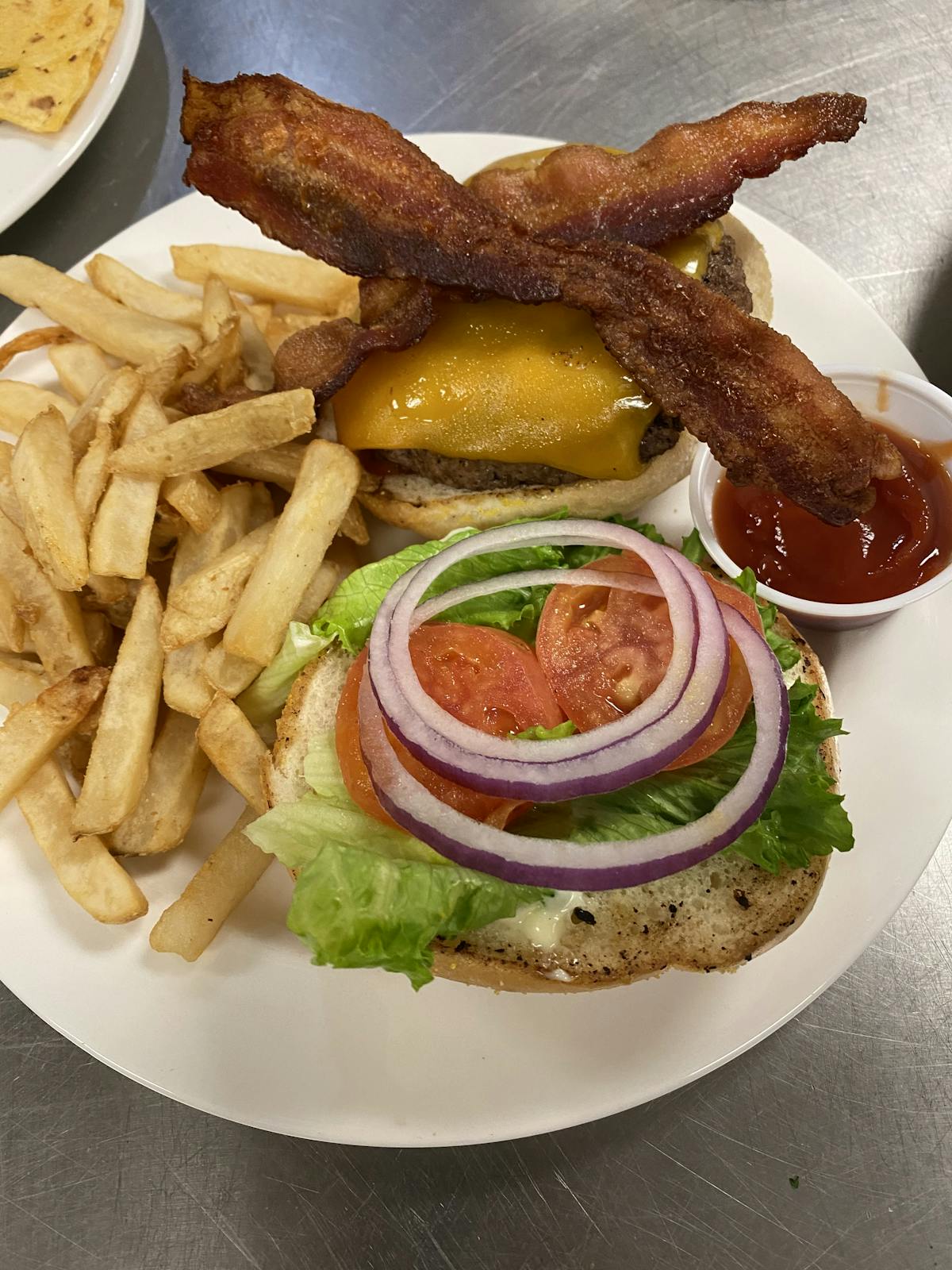 Burger and fries on a plate