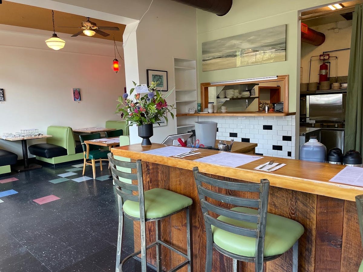 a room filled with furniture and a table