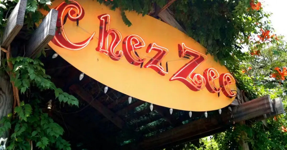 a sign with red letters