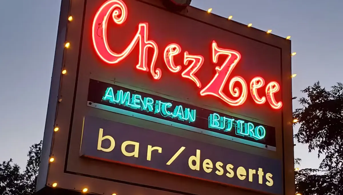 a sign with neon lights
