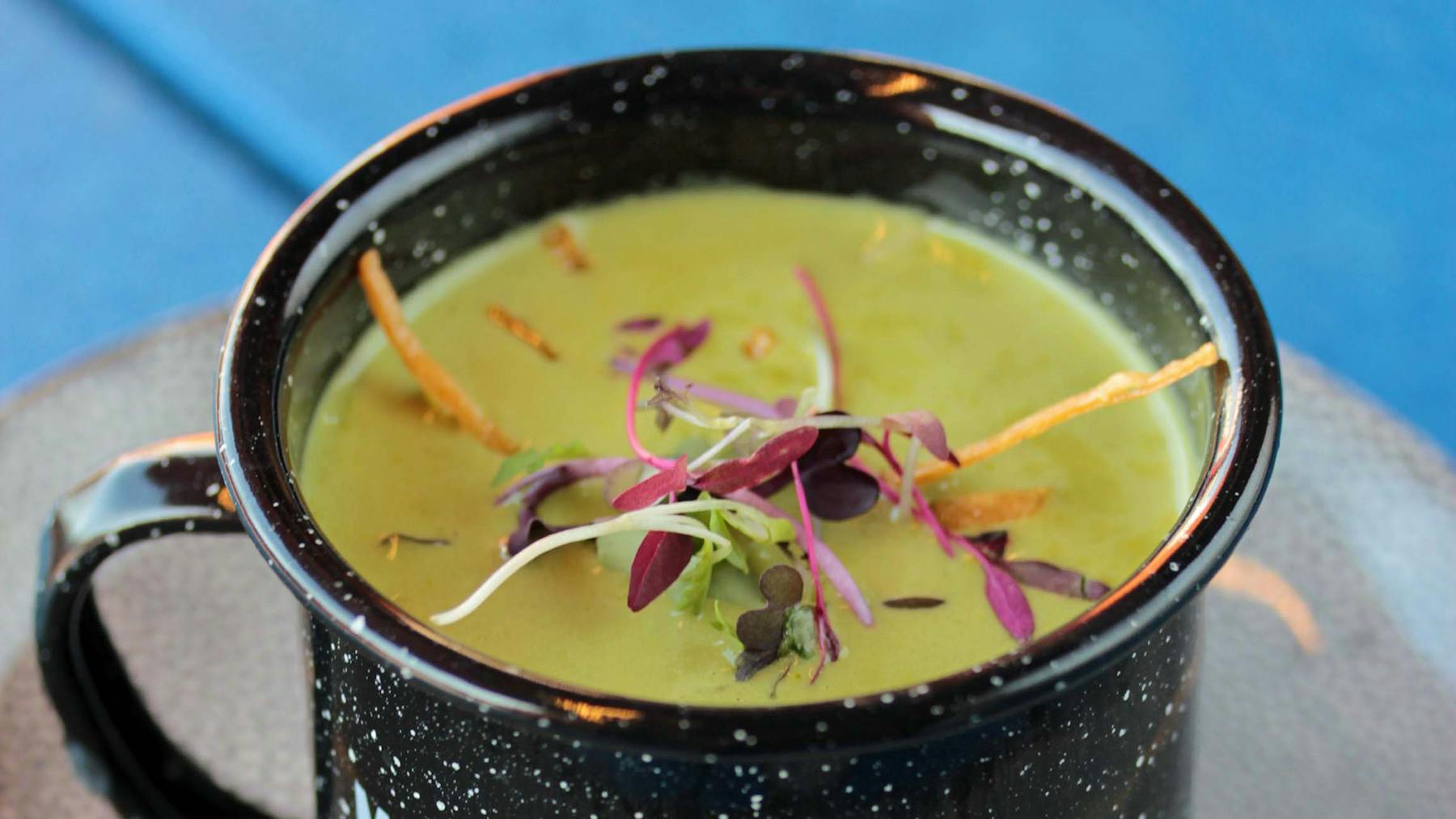 a bowl of soup and a spoon