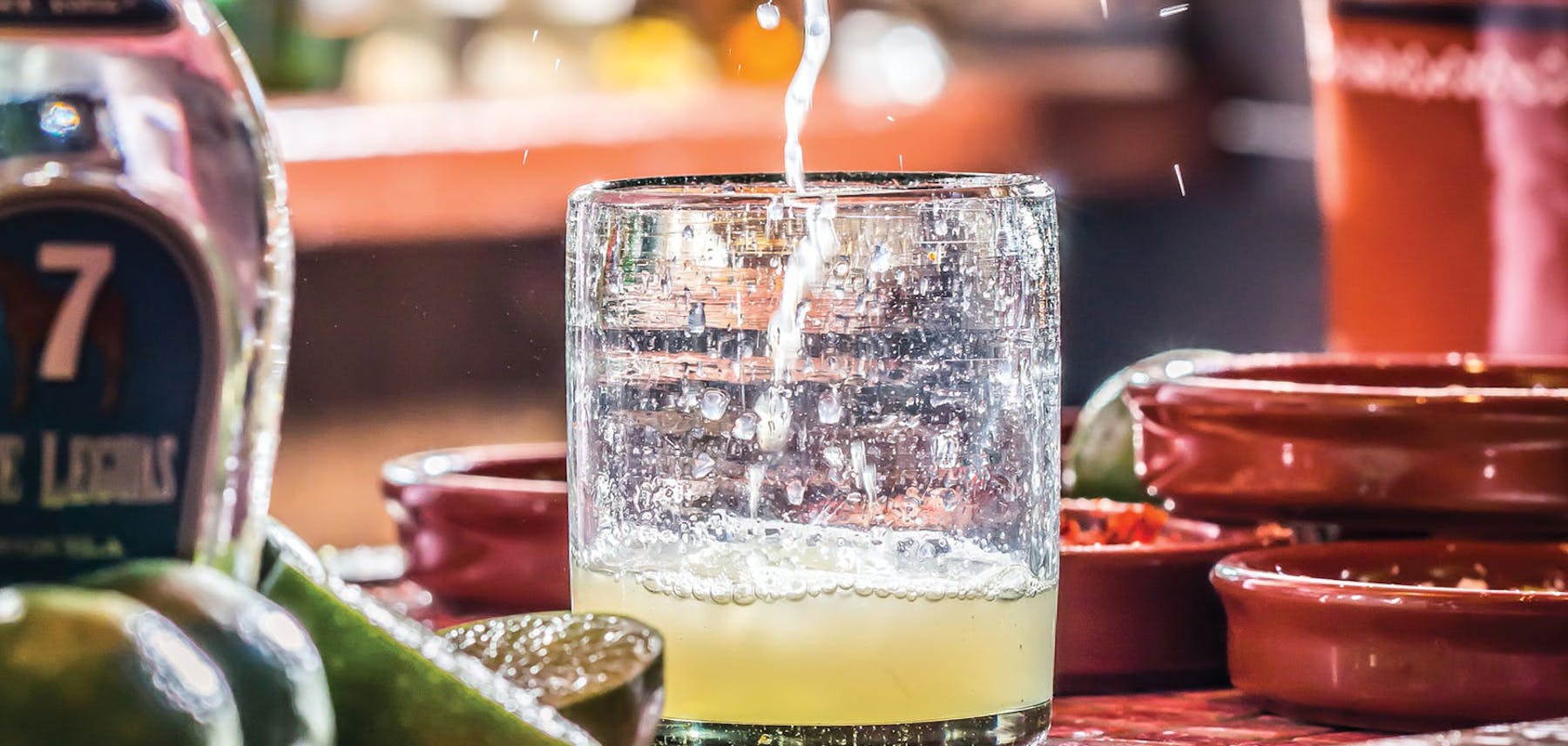 A margarita being made.
