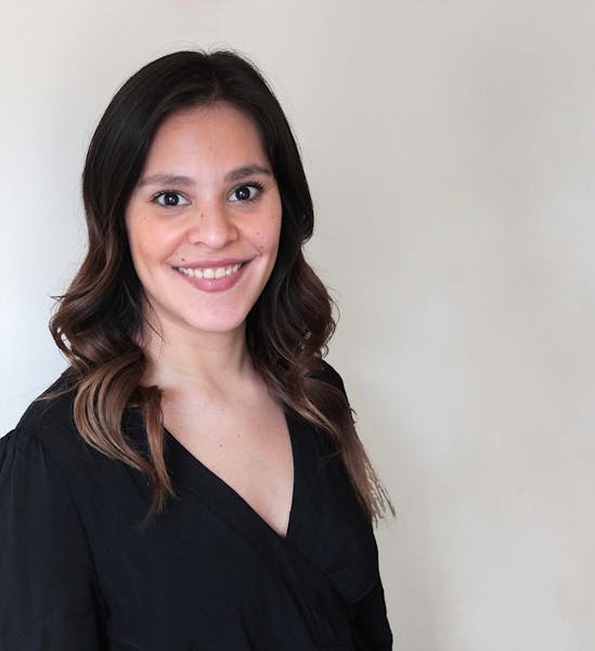 a woman smiling for the camera