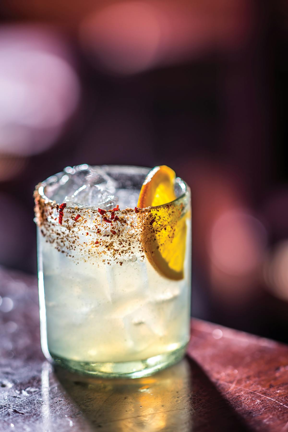 a close up of a glass cup on a table