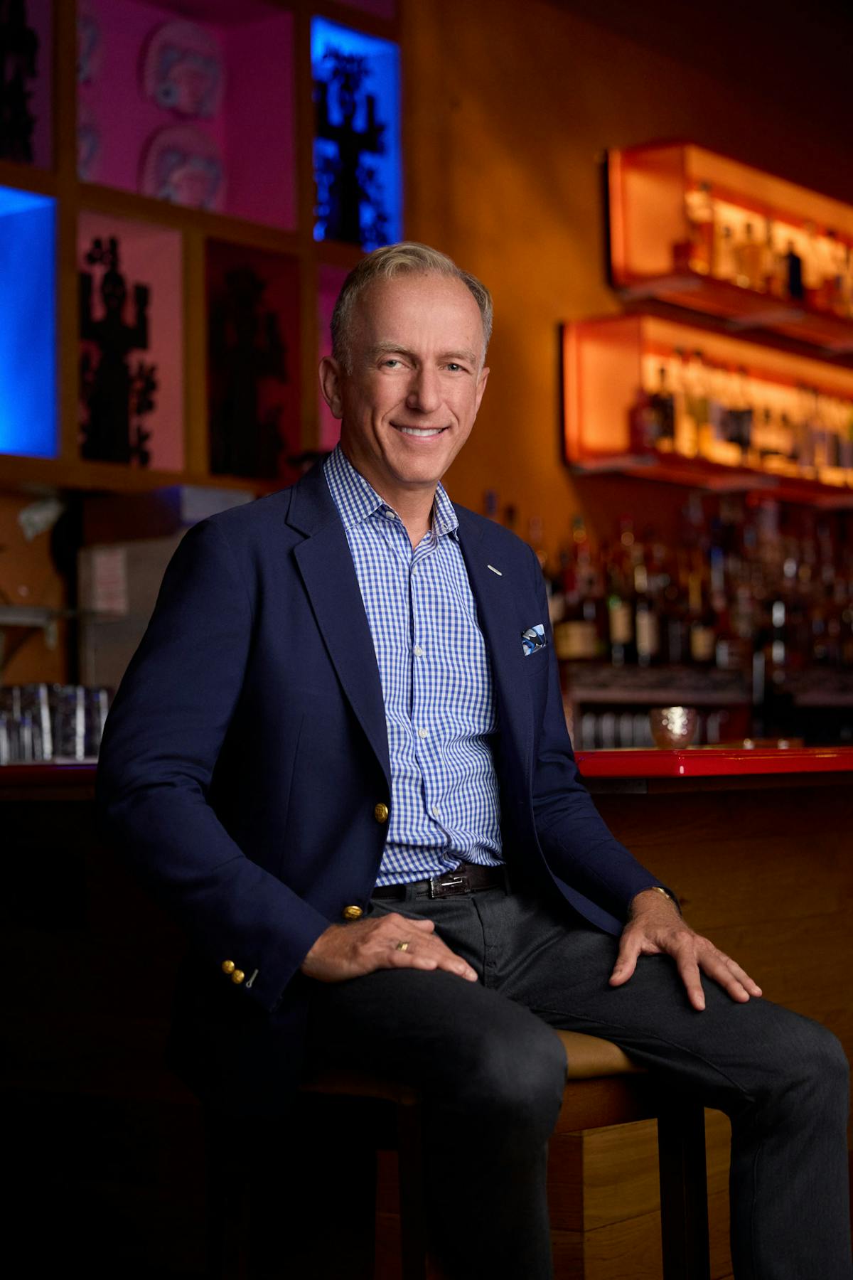 Greg Deligdisch wearing a suit and tie