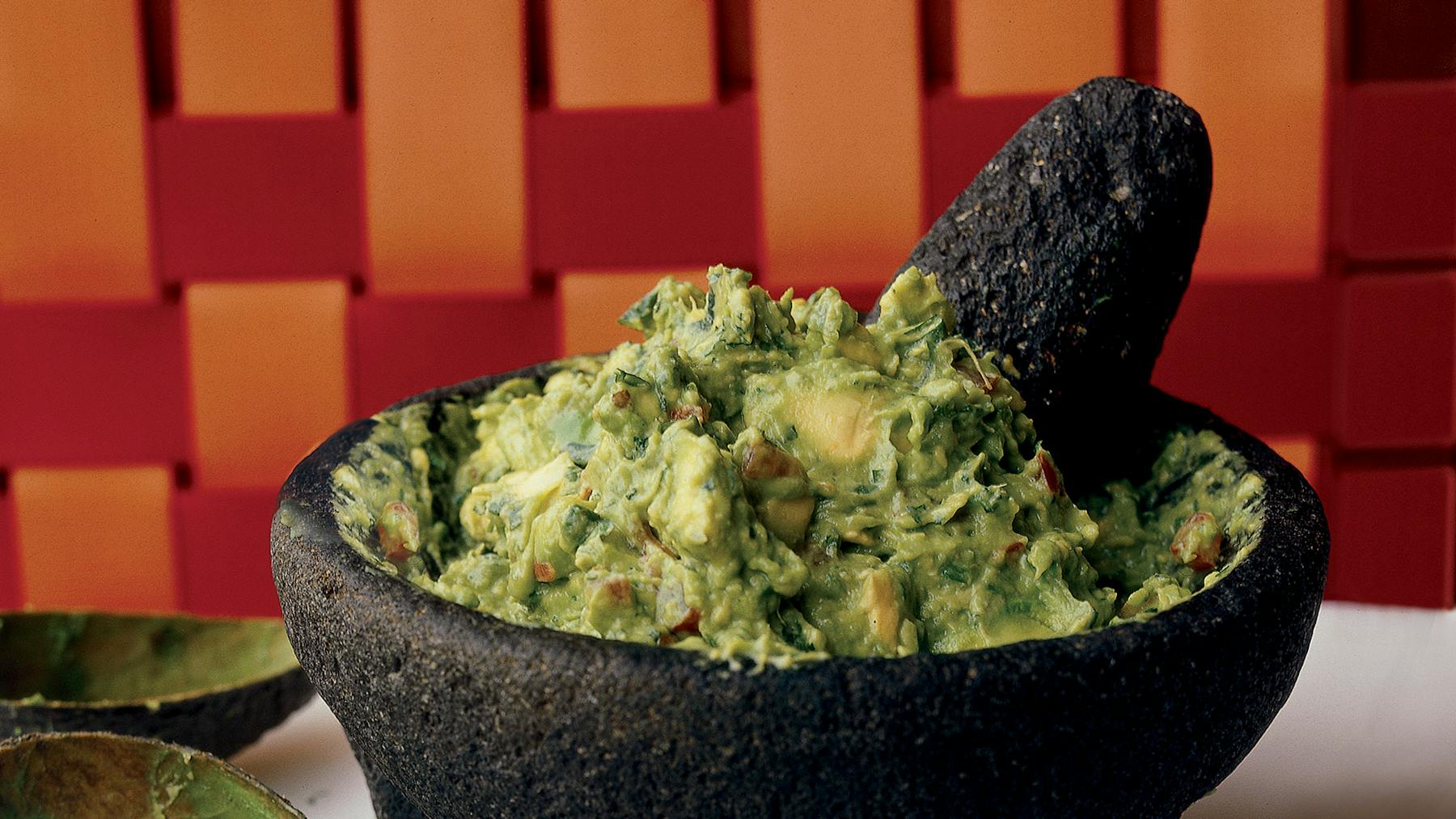 A bowl of guacamole.