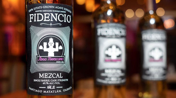 mezcal bottles on wooden table