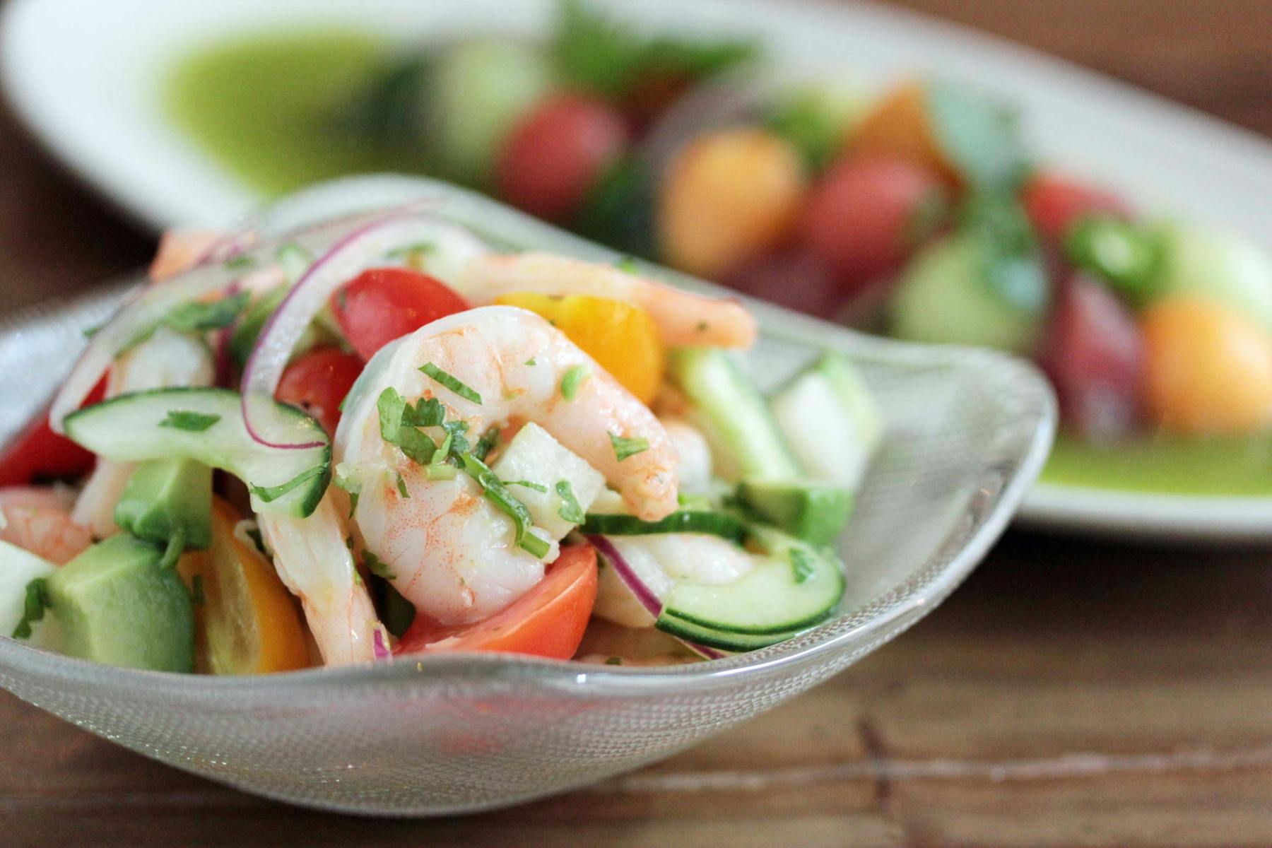 a bowl of fruit salad on a plate